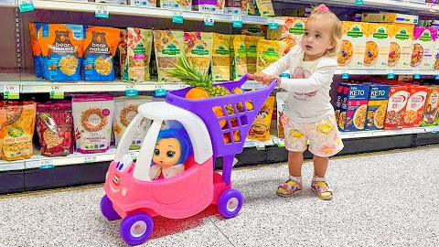 Alice and Baby doll doing shopping in the supermarket