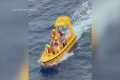 Dad jumps overboard to save daughter