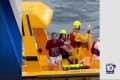 Father jumps into ocean after child
