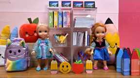 New backpacks! Elsa & Anna toddlers - shopping for school supplies - Barbie dolls